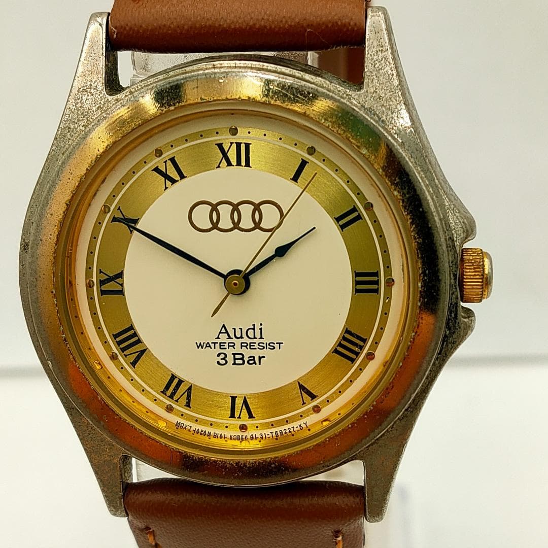 Audi Audi Quattro Crater Gold-Tone Dial Roman Numeral Quartz Watch